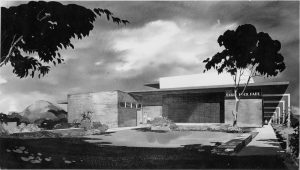 Eagle Rock Recreation Center Clubhouse Rendering 1953 The dream of a park near the rock was fulfilled in 1954 when this clubhouse on a large site across Figueroa from the earlier “park” opened. Richard Neutra’s post and beam building featured a stage that opened to the large gym, an outdoor amphitheatre and a smaller meeting room. The counterweighted walls of the gym could be raised for ventilation. The building was in many ways the culmination of the architect’s classic approach to modern building. Garrett Ekbo designed the grounds which were completed in 1959. (Rendering by R.C. Quale) 