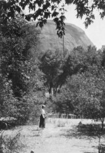 Miss Pratt is depicted in the then wild canyon below the Eagle Rock with its riparian life. Outdoor excursions were a favorite activity. She led groups of students and Audubon society members on hikes in the Eagle Rock area finding then abundant wildlife. (ERVHS-Pratt Collection)