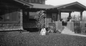 About the same time, planting in front of the house. At this time her  “days were filled with activity all geared to the outdoors. Those who remember her well, often comment about her boundless energy. She could crowd lectures, demonstrations, a study course and still have time to “bird watch” and write about her experiences far into the night; then up at sunrise, watching the birds have their early breakfast.” (quote Eagle Rock Sentinel- Nelda Thompson, photo ERVHS-Pratt Collection)