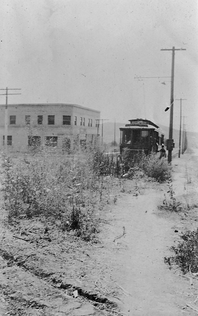 The Bailey Block sits isolated on Townsend Avenue at the end of a widened but still dirt street. Behind us the Eagle Rock Road to Garvanza and Pasadena was small and unimproved.  Long known as the Murfield block, the building now houses Tritch Hardware. (Courtesy the Elena Frackelton Murdock family)